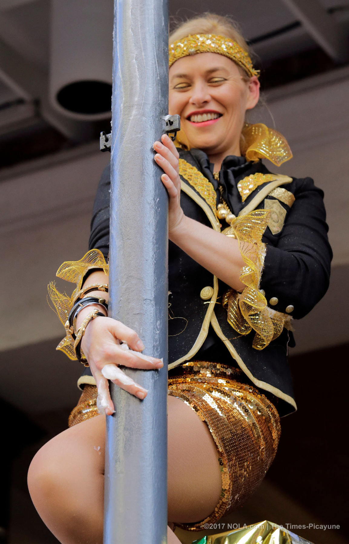 Only on Bourbon Street: Greasing of the Poles for Mardi Gras
